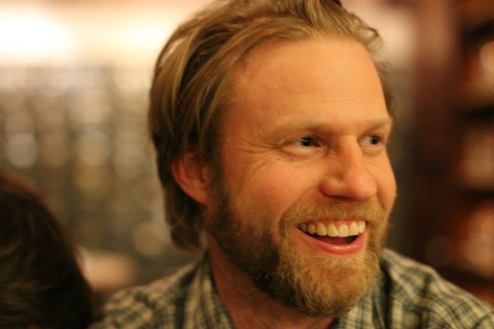 Voxolo founder Justin smiling at the Hofbräuhaus in Munich